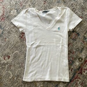 Women’s size small, V-neck Ralph Lauren, short sleeve shirt. (L)